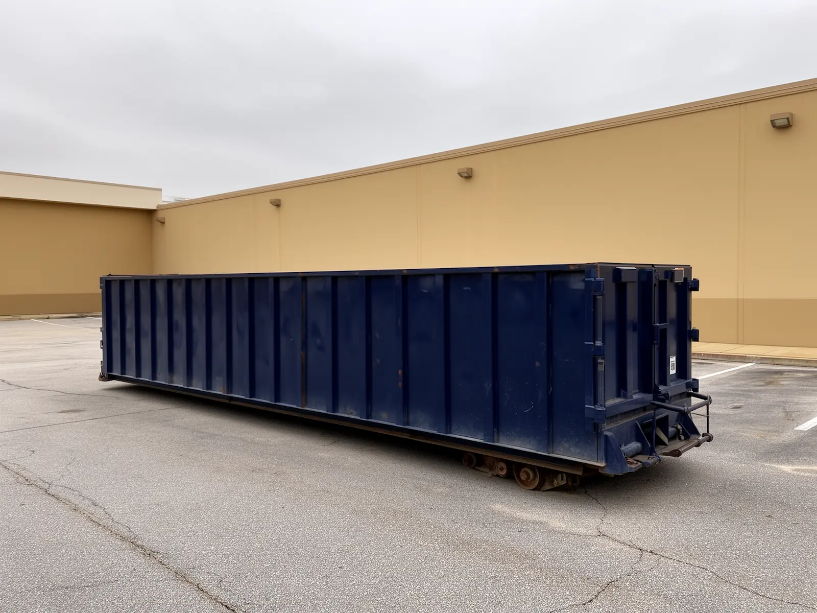 Roll-off dumpster from Green Barn Dumpsters in Apopka, FL